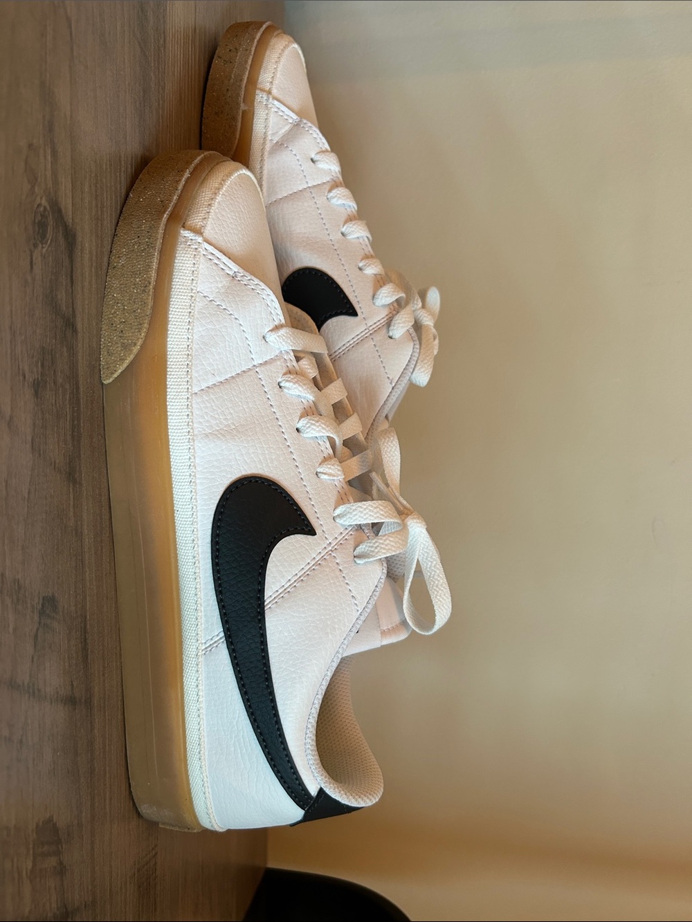 Nike Women's White Leather Sneakers with Black Swoosh